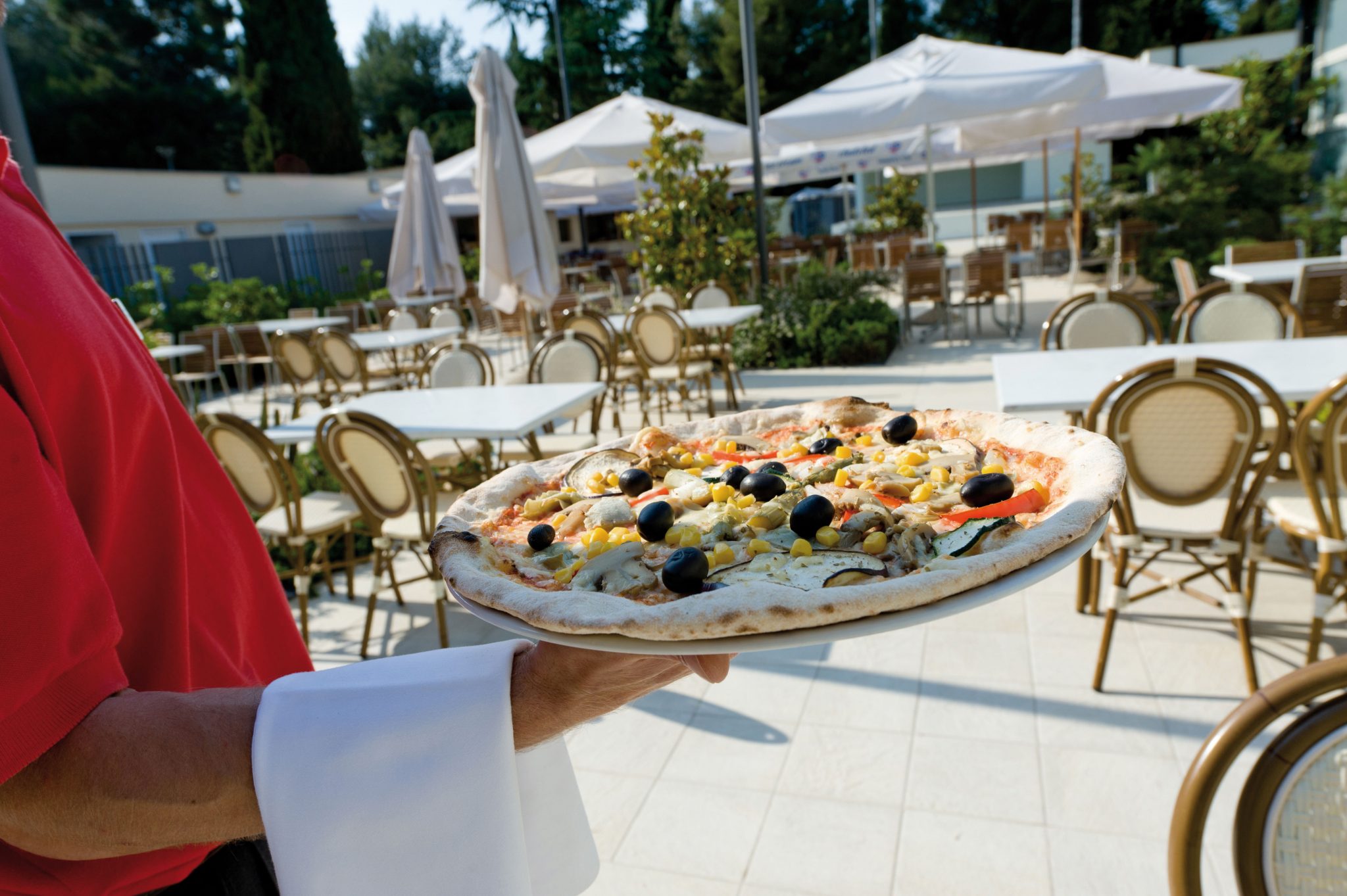 Pizza im Restaurant auf Camping Valkanela in Istrien. Foto: Camping Valkanela.